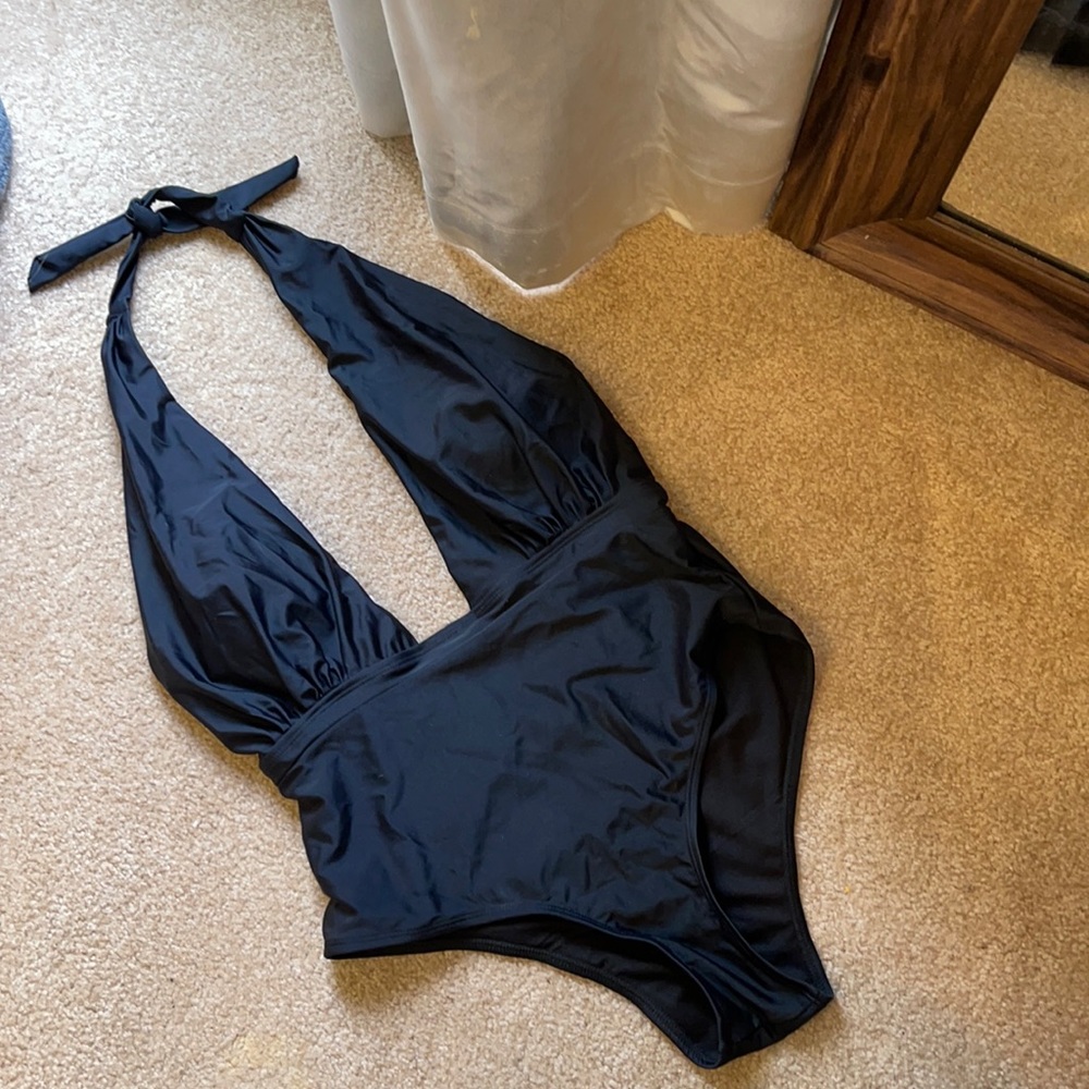 Low cut black one piece